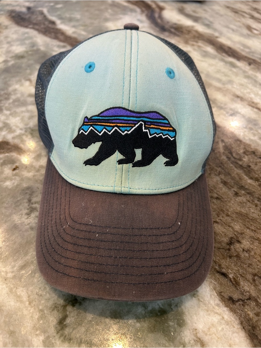 Patagonia Fitz Roy bear Trucker Cap has wear loose threads needs wash